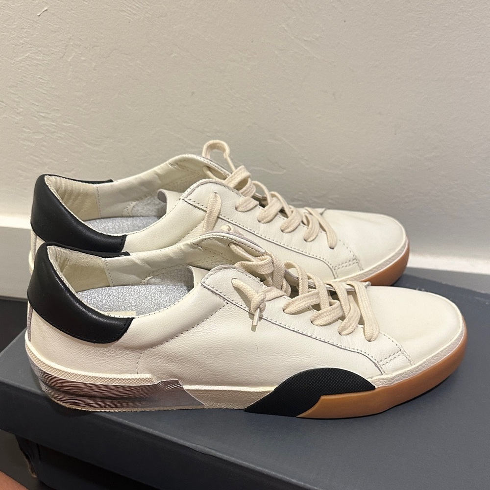 New Balance White and Black Sneakers